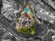 Bird's eye view shows the beautiful estate, surrounded by lush landscaping, pool and solar panels at 3004 Astoria Pines Cir, Las Vegas, NV 89107