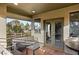 Comfortable covered patio with outdoor seating, offering a relaxing outdoor space at 3004 Astoria Pines Cir, Las Vegas, NV 89107