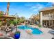 Expansive backyard pool and patio area with lush landscaping, perfect for outdoor entertaining at 3004 Astoria Pines Cir, Las Vegas, NV 89107