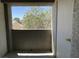 Cozy balcony offering an outdoor space with some privacy and views of neighborhood foliage at 3151 Soaring Gulls Dr # 2147, Las Vegas, NV 89128