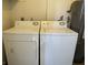 Functional laundry room features standard washer and dryer units with basic utility connections at 3151 Soaring Gulls Dr # 2147, Las Vegas, NV 89128