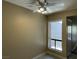 The Living Room has neutral paint and a window at 3151 Soaring Gulls Dr # 2147, Las Vegas, NV 89128