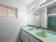 Bathroom featuring a double sink vanity and shower at 3212 Silver Saddle St, Las Vegas, NV 89169