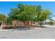 Charming single-story home with mature trees, a desert-landscaped yard, and a long driveway at 3212 Silver Saddle St, Las Vegas, NV 89169