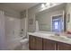 Bright bathroom featuring a shower-tub combo, large vanity, and ample counter space at 3213 Molinos Dr, Las Vegas, NV 89141