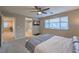 Comfortable main bedroom with a window, TV, and en-suite bathroom at 3213 Molinos Dr, Las Vegas, NV 89141