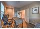 This office features a modern desk, comfortable chair and wood floors at 3213 Molinos Dr, Las Vegas, NV 89141