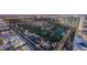 Expansive aerial view of a neighborhood featuring lush greenery, a golf course, and charming homes at 322 Karen Ave # 3801, Las Vegas, NV 89109
