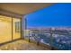 Open-air balcony view displaying distant city buildings and picturesque scenery from an elevated position at 322 Karen Ave # 3801, Las Vegas, NV 89109
