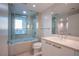 Bathroom with tub and a stand-up shower, along with a window to enjoy the views at 322 Karen Ave # 3801, Las Vegas, NV 89109