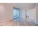 Light-filled bedroom with floor to ceiling windows and ensuite bath access at 322 Karen Ave # 3801, Las Vegas, NV 89109
