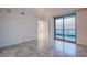 Spacious bedroom with a sliding glass door leading to a balcony with amazing views of the city at 322 Karen Ave # 3801, Las Vegas, NV 89109