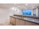 Modern kitchen with granite counters, stainless appliances, and views of city at 322 Karen Ave # 3801, Las Vegas, NV 89109