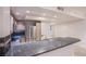 Modern kitchen featuring granite counters, stainless steel appliances and a breakfast bar at 322 Karen Ave # 3801, Las Vegas, NV 89109