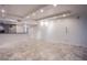 Open-plan living area with a kitchen featuring marble floors, neutral walls, and recessed lighting at 322 Karen Ave # 3801, Las Vegas, NV 89109