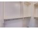 Walk-in closet featuring custom shelves and chrome closet rods at 322 Karen Ave # 3801, Las Vegas, NV 89109