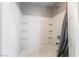 Bright bathroom showcasing a shower-tub combination with a white shower curtain and tiled wall surround at 3221 Pergusa Dr, Henderson, NV 89044