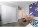 Bedroom with closet, playful decorations, and gray carpet providing a soft and comfortable feel at 3221 Pergusa Dr, Henderson, NV 89044