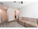Upstairs bonus room with a large couch at 3221 Pergusa Dr, Henderson, NV 89044