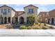 Charming two-story home with well-manicured landscaping and inviting curb appeal in a desirable neighborhood at 3221 Pergusa Dr, Henderson, NV 89044