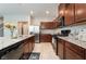 Well-equipped kitchen featuring a granite counters, and modern appliances at 3221 Pergusa Dr, Henderson, NV 89044