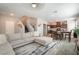 Spacious living area flows into the dining and kitchen, great for entertaining and everyday living at 3221 Pergusa Dr, Henderson, NV 89044