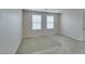 Large bedroom with neutral walls, carpet, and natural light at 3270 Palindrome Ave, Henderson, NV 89044