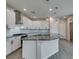 Gorgeous kitchen featuring an island, stainless appliances, and pendant lighting at 3270 Palindrome Ave, Henderson, NV 89044