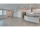 View of living area with adjacent kitchen and staircase at 3270 Palindrome Ave, Henderson, NV 89044