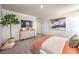 Tastefully decorated bedroom with modern furniture, stylish accents, and a calming atmosphere at 3389 La Cura Ave # Lot 43, Las Vegas, NV 89141