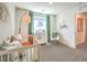 Charming Bedroom with crib, dresser, and accents, offering a serene atmosphere for your little one's comfort at 3389 La Cura Ave # Lot 43, Las Vegas, NV 89141