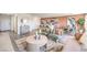 Open-concept living area with adjacent dining and kitchen, great for entertaining, and showcases modern decor at 3389 La Cura Ave # Lot 43, Las Vegas, NV 89141