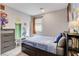 Fun bedroom featuring unique Mario-themed decor, a cozy bed, and ample lighting at 361 Cooper Hawk Ct, Las Vegas, NV 89138