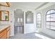 Bathroom with double sinks and arched windows at 4083 Nook Way # D, Las Vegas, NV 89103