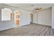 Large bedroom with wood-look floors and access to bathroom at 4083 Nook Way # D, Las Vegas, NV 89103