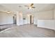 Open-concept living area with wood-look floors, seamlessly connecting to the kitchen at 4083 Nook Way # D, Las Vegas, NV 89103