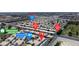 Aerial view of community amenities like the pool, golf course and nearby roads at 4800 Grey Wolf Ln # 202, Las Vegas, NV 89149