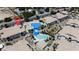 A captivating aerial view highlighting the community pool and the home's convenient location at 4800 Grey Wolf Ln # 202, Las Vegas, NV 89149