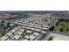 An elevated shot shows a community with community pool near a golf course at 4800 Grey Wolf Ln # 202, Las Vegas, NV 89149