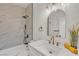 Updated bathroom featuring modern fixtures, a tub with shower, and stylish decor at 4800 Grey Wolf Ln # 202, Las Vegas, NV 89149