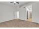 Large bedroom with modern lighting leading to closet and bathroom at 4800 Grey Wolf Ln # 202, Las Vegas, NV 89149