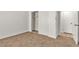 Bedroom featuring neutral carpeting and a closet with sliding doors at 4800 Grey Wolf Ln # 202, Las Vegas, NV 89149