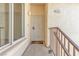 Exterior shot of front door entry to the home with security gate and railing at 4800 Grey Wolf Ln # 202, Las Vegas, NV 89149