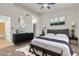 Comfortable main bedroom featuring a queen bed, ceiling fan, and modern decor at 4800 Grey Wolf Ln # 202, Las Vegas, NV 89149