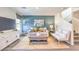 Cozy living room featuring a comfortable sofa and a stylish yellow rug at 4979 Sage Mesa Ave # Lot 147, Las Vegas, NV 89139