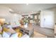 Bright living space with open layout flowing into the kitchen and dining area at 4979 Sage Mesa Ave # Lot 147, Las Vegas, NV 89139