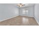 This bedroom features a ceiling fan and a window for ample natural light at 503 Credence Ave, Henderson, NV 89002