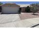 Charming single-story home featuring a tile roof, stucco exterior, and a two-car garage at 503 Credence Ave, Henderson, NV 89002