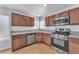 Updated kitchen with stainless steel appliances, granite countertops, ample cabinet space, and a window at 503 Credence Ave, Henderson, NV 89002