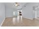 View of a spacious living room with tile floors and a view of the kitchen at 503 Credence Ave, Henderson, NV 89002